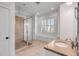 Tiled bathroom with a glass-enclosed shower, a single vanity, and recessed lighting at 172 Mary Ellen Dr, Charleston, SC 29403