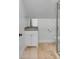 Compact bathroom includes walk-in shower with glass door, neutral tile, and a single vanity for functionality at 172 Mary Ellen Dr, Charleston, SC 29403