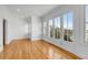 Spacious bedroom with hardwood floors, balcony access, and abundant natural light at 172 Mary Ellen Dr, Charleston, SC 29403