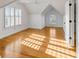 This bedroom offers hardwood floors, neutral walls, and a large window for natural light, creating a cozy space at 172 Mary Ellen Dr, Charleston, SC 29403
