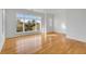 Bright bedroom featuring a large window with outside views and gleaming hardwood floors at 172 Mary Ellen Dr, Charleston, SC 29403