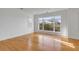 Bright bedroom featuring hardwood floors, natural light and tree views at 172 Mary Ellen Dr, Charleston, SC 29403