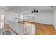 Spacious bonus room boasts hardwood floors, a wet bar, recessed lights, and multiple windows with plantation shutters at 172 Mary Ellen Dr, Charleston, SC 29403