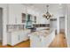 Well-lit kitchen featuring white cabinets, stainless steel appliances, and marble countertops at 172 Mary Ellen Dr, Charleston, SC 29403