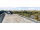 A spacious rooftop deck provides views of the marsh and surrounding landscape at 172 Mary Ellen Dr, Charleston, SC 29403