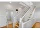 Bright staircase with white railings and wood treads at 172 Mary Ellen Dr, Charleston, SC 29403