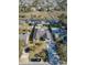Stunning aerial view of a single-Gathering home with a pool, landscaped yard, private dock, and waterfront access at 1886 Capri Dr, Charleston, SC 29407