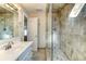 Updated bathroom featuring a glass enclosed shower, vanity, and tile floors at 1886 Capri Dr, Charleston, SC 29407
