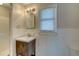 Bathroom featuring an updated vanity, mirror, and shower-tub combo at 1886 Capri Dr, Charleston, SC 29407