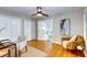 Bright bedroom with hardwood floors, ceiling fan, and walk-in closet at 1886 Capri Dr, Charleston, SC 29407
