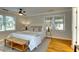 Bedroom featuring hardwood floors, a ceiling fan, and lots of natural light at 1886 Capri Dr, Charleston, SC 29407