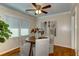 Cozy dining room with hardwood floors and modern ceiling fan at 1886 Capri Dr, Charleston, SC 29407