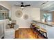 Eat-in kitchen features wood floors and stylish seating area with natural lighting at 1886 Capri Dr, Charleston, SC 29407