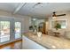 Spacious kitchen island with granite countertop and backyard access at 1886 Capri Dr, Charleston, SC 29407