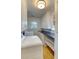 Clean and functional laundry room with ample cabinet space, countertops, and a window for natural light at 1886 Capri Dr, Charleston, SC 29407