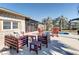 Enjoy this spacious patio with outdoor seating, a screened-in porch, and a view of the inviting swimming pool at 1886 Capri Dr, Charleston, SC 29407