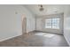 Bright living room featuring modern flooring, neutral paint, and ample natural light from the window at 191 Blackstone Dr, Moncks Corner, SC 29461