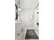 Bathroom with elegant vanity, tile floors, and tub at 203 Horseshoe Rd, Moncks Corner, SC 29461