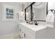 Bathroom featuring double vanity, modern lighting, and fixtures at 203 Horseshoe Rd, Moncks Corner, SC 29461