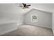 Bright bedroom featuring vaulted ceilings, ceiling fan, and a large window for natural light at 203 Horseshoe Rd, Moncks Corner, SC 29461