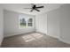 Bedroom featuring a closet, gray carpet, and ceiling fan at 203 Horseshoe Rd, Moncks Corner, SC 29461