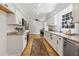 Bright kitchen with stainless steel dishwasher, granite countertops and stylish details at 203 Horseshoe Rd, Moncks Corner, SC 29461