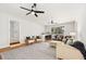 Open living area with hardwood floors, modern furniture, and natural light at 203 Horseshoe Rd, Moncks Corner, SC 29461