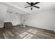 Open living room featuring hardwood floors and a ceiling fan at 203 Horseshoe Rd, Moncks Corner, SC 29461