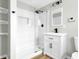 Updated bathroom with white subway tile shower and vanity at 204 Delano St, Saint George, SC 29477