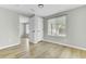 Bedroom featuring window and wood-look flooring at 204 Delano St, Saint George, SC 29477