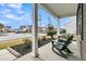 Inviting front porch with rocking chairs and landscaping, offering a relaxing outdoor space with neighborhood views at 233 Old Carolina Dr, Goose Creek, SC 29445