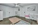 Bright bedroom features white walls and hardwood floors, offering a clean and inviting space for relaxation and play at 242 Weathers Farm Rd, Bowman, SC 29018