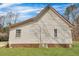 Side view of a home with white siding and a red roof at 242 Weathers Farm Rd, Bowman, SC 29018