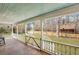 Spacious covered porch featuring a wooden ceiling and railing at 242 Weathers Farm Rd, Bowman, SC 29018