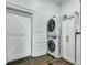 Bright laundry room with a stacked washer and dryer at 242 Weathers Farm Rd, Bowman, SC 29018