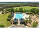 Beautiful aerial view featuring a community pool, playground, and lush green surroundings near a golf course at 2788 Carolina Isle Dr, Mount Pleasant, SC 29466