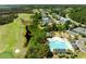 Picturesque aerial view of a community pool near a golf course and waterfront homes, with lush green landscaping at 2788 Carolina Isle Dr, Mount Pleasant, SC 29466