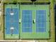 Aerial view of basketball and tennis courts, providing a recreational space in a well-maintained community at 2788 Carolina Isle Dr, Mount Pleasant, SC 29466