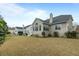 Well-maintained home backyard with a cozy exterior, an inviting patio area, and landscaped surroundings at 2788 Carolina Isle Dr, Mount Pleasant, SC 29466