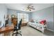 Comfortable bedroom with a daybed, desk, bookshelves, and ceiling fan at 2788 Carolina Isle Dr, Mount Pleasant, SC 29466