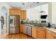 Bright kitchen featuring granite countertops, stainless steel appliances, and hardwood floors at 2788 Carolina Isle Dr, Mount Pleasant, SC 29466