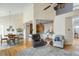 Open-concept living room with vaulted ceilings and an adjacent breakfast nook and kitchen at 2788 Carolina Isle Dr, Mount Pleasant, SC 29466