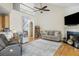 Open living room with staircase, fireplace, and comfortable seating arrangement at 2788 Carolina Isle Dr, Mount Pleasant, SC 29466