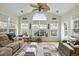 Inviting sunroom filled with natural light, offering views of the surrounding landscape at 2788 Carolina Isle Dr, Mount Pleasant, SC 29466