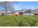 Large backyard with a wooden fence and a house with a deck and patio at 2915 Nantuckett Ave, North Charleston, SC 29420