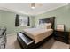 Cozy bedroom with a comfortable bed, ceiling fan, and neutral decor at 2915 Nantuckett Ave, North Charleston, SC 29420