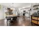 Eat-in kitchen featuring stainless steel appliances, white cabinetry, and modern lighting at 2915 Nantuckett Ave, North Charleston, SC 29420