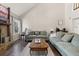 Cozy living room features a fireplace, hardwood floors, and comfortable seating with modern decor at 2915 Nantuckett Ave, North Charleston, SC 29420