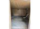 Unfinished basement space featuring wood paneled walls and concrete flooring, ready for customization at 313 Springwood Dr, Walterboro, SC 29488