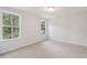 Bedroom with neutral carpet and a view of the backyard at 3154 Vanessa Lynne Ln, Johns Island, SC 29455